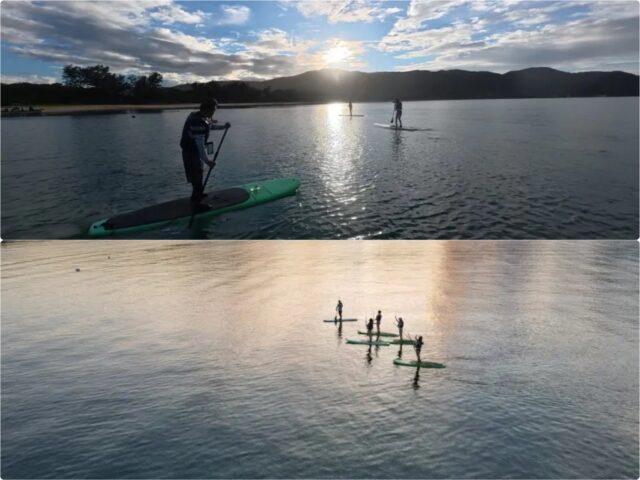 奄美大島でサンセットSUPを楽しむ人々